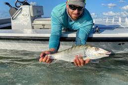 Captain Ken Diaz posing with a Biscayne Bay Bonefish in Miami